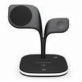 Black 3-in-1 wireless charging stand with phone, Apple Watch, and headphones placed on it.