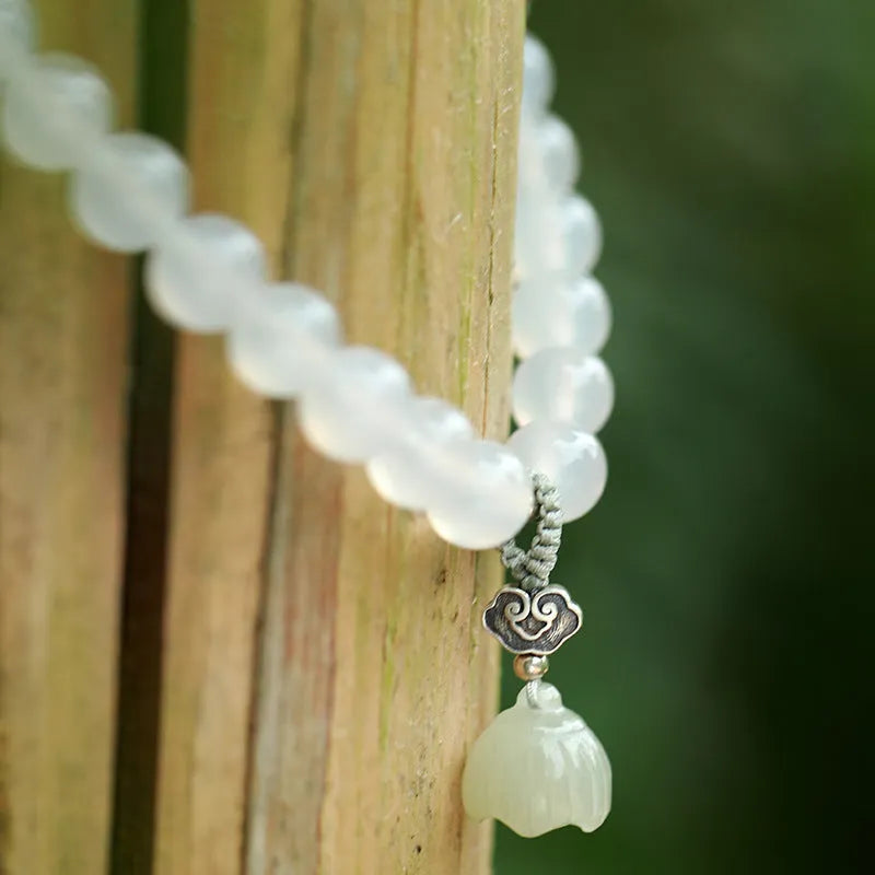 Women's bracelet with S925 silver clasp, white agate and Hetian jade beads in geometric lotus design