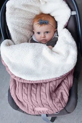Envelope-style baby stroller sleeping bag in beige colour showing thick cotton wool filling and soft lining.