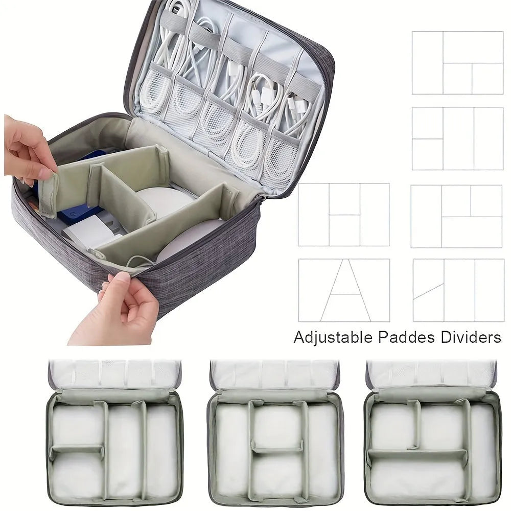 Black waterproof cable organizer bag open, showing removable dividers and mesh pockets for electronics.