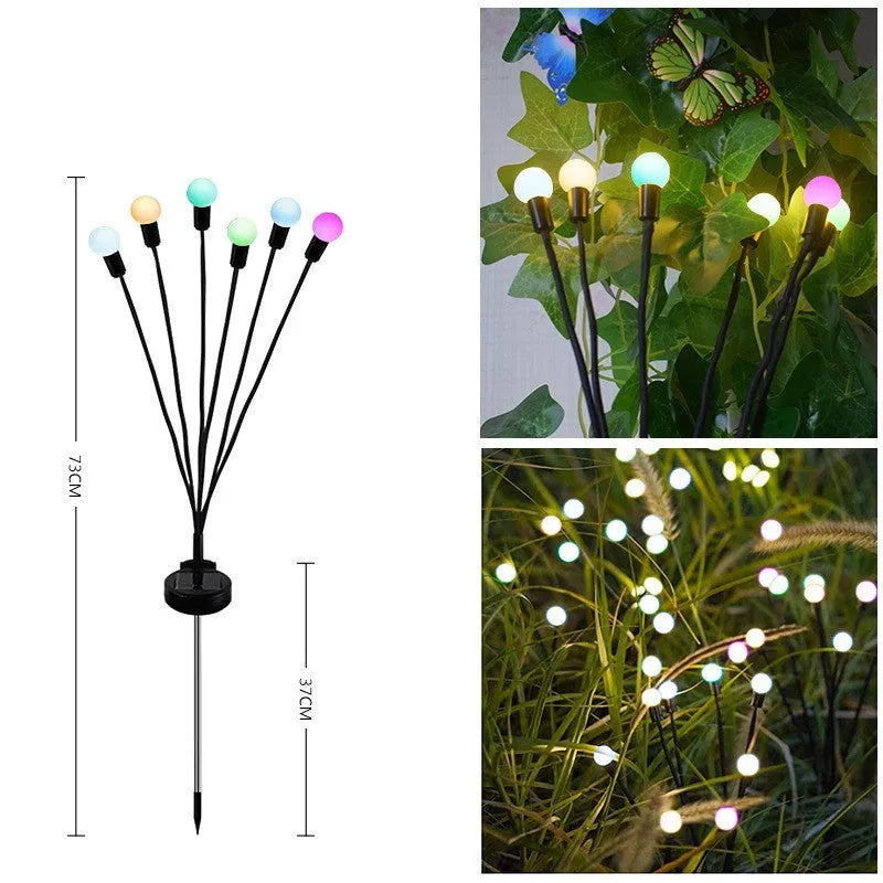 Solar-powered LED garden light with multiple heads on a metal spike in grass.