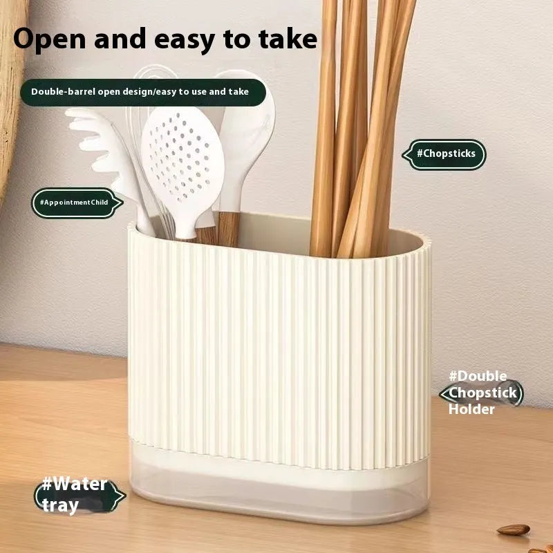 A beige plastic wall-mounted chopsticks holder with a cross-border drain design for kitchen utensil storage.