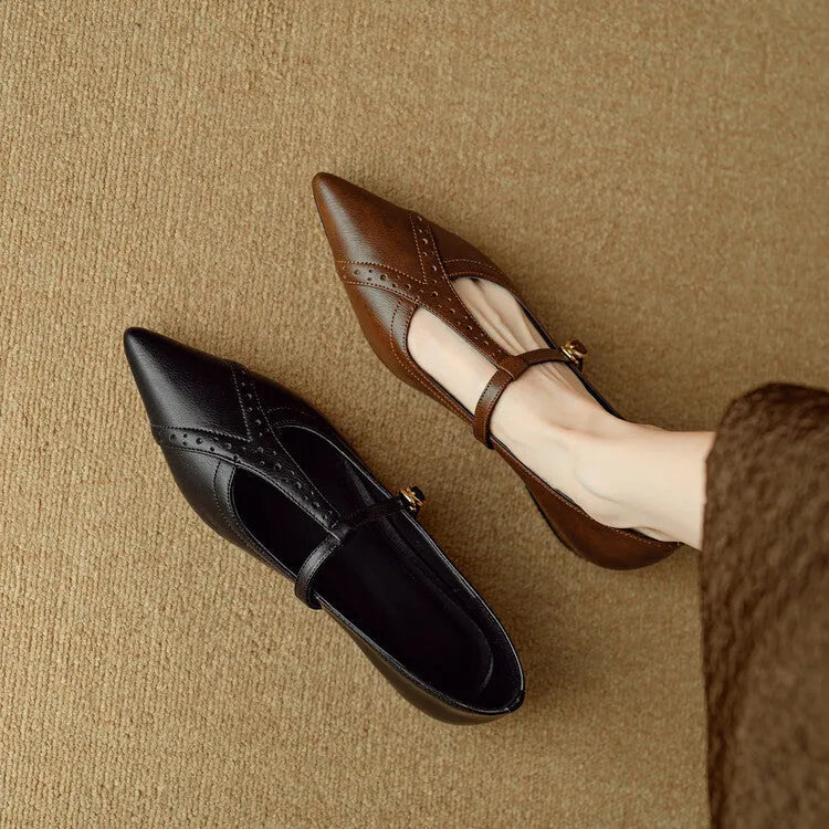 Brown pointed low-cut women's flat shoes with round toe and metal decoration on cowhide upper.