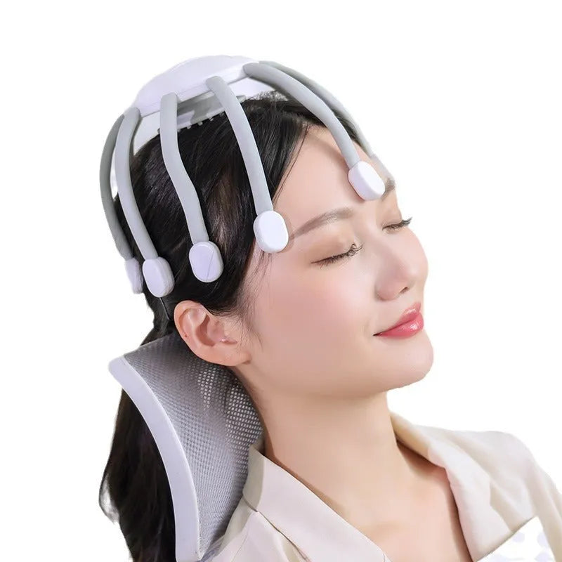 Black electric head massager with eight silicone-tipped claws extending from central handle