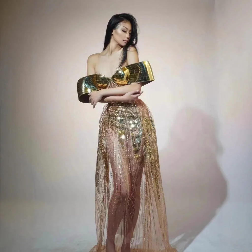 Gold strapless sequined evening dress with high split skirt and full sequin coverage