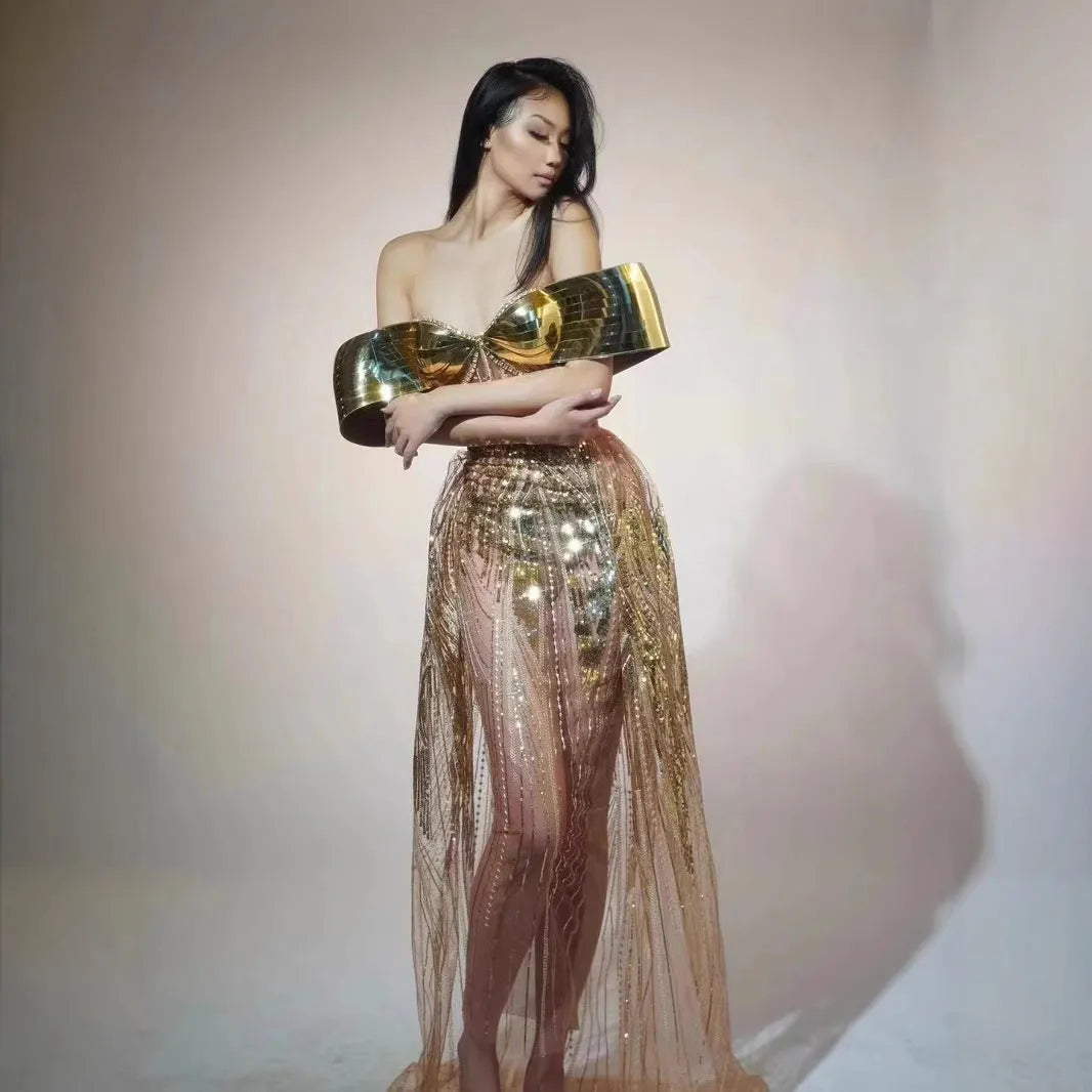 Gold strapless sequined evening dress with high split skirt and full sequin coverage