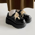 Retro British matte black women's shoes with thick sole, lace-up buckle, and round toe design in size 35-40.