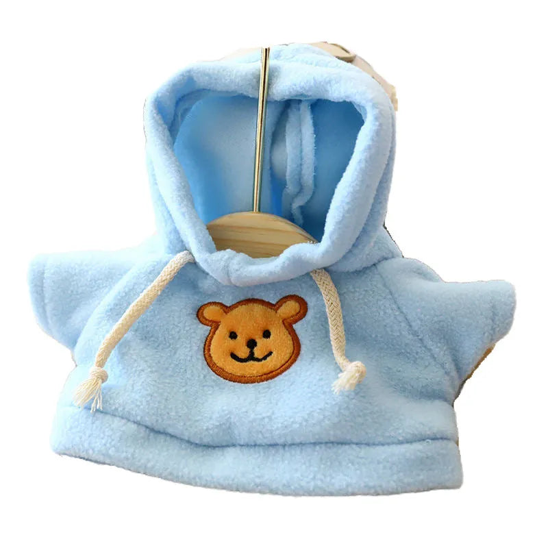 Dog wearing a cloth balaclava hoodie sweater available in blue, pink, red, yellow, brown, or grey bear design