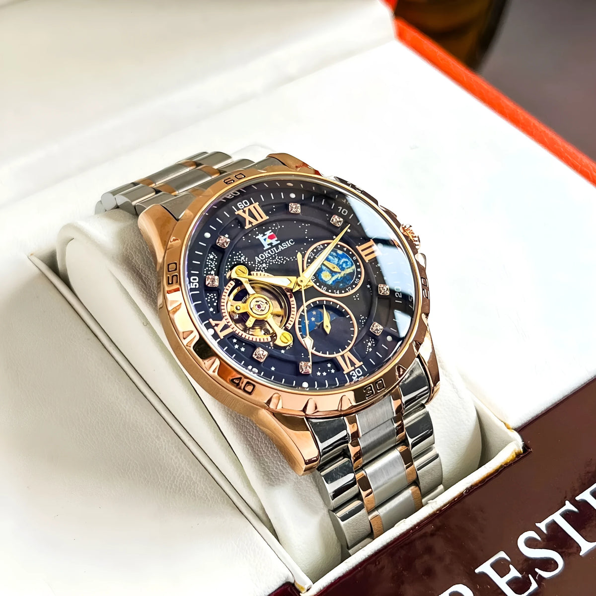 Men's automatic mechanical watch with rose gold shell, black dial, large display, and 12mm thickness