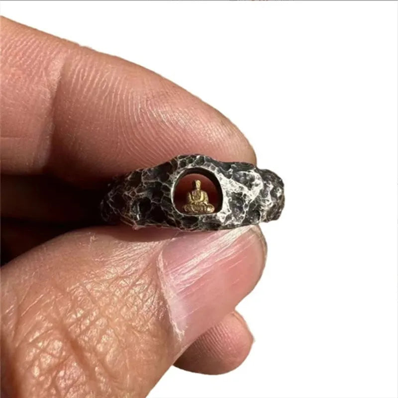 Hand-forged copper Grotto Buddha ring with rock texture finish showing size 8