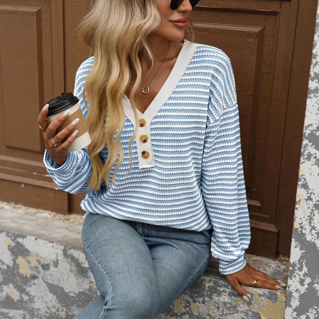 Women's loose V-neck pullover top with button front and patchwork style in various colours.