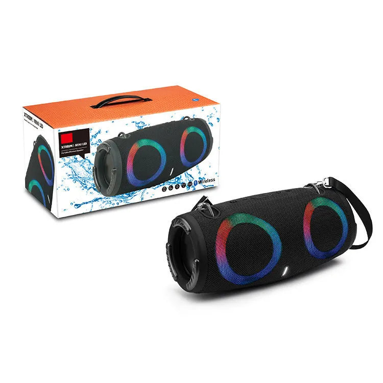 War Drum portable Bluetooth speaker with glowing RGB coloured lights in a camouflage colour variant.