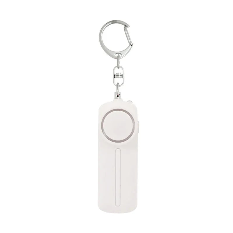 Compact pink personal safety alarm with keyring, showing dimensions relative to a hand.