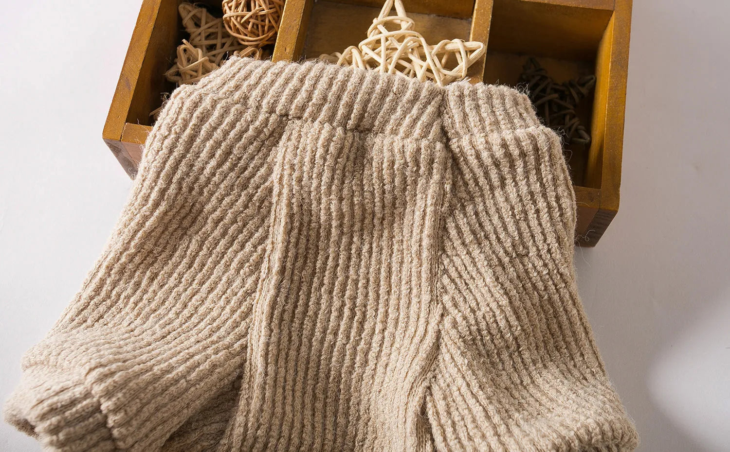 Brown knitted sweater pullover on a small dog, available in sizes XS to XL