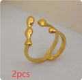 Brass opening ring with sphere circle detail in gold colour, adjustable women's fashion jewellery