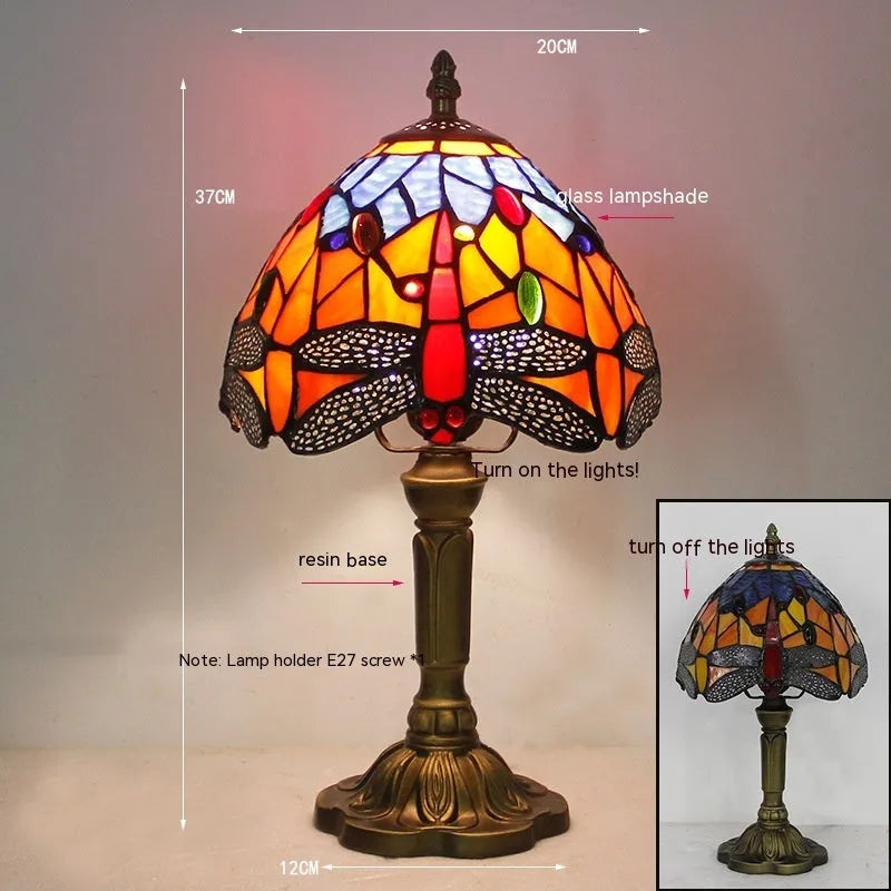 Stone table lamp with Tiffany-style blue dragonfly design on base
