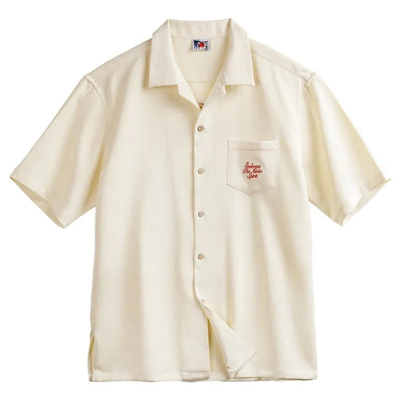 Light apricot men's Cuban collar shirt with bamboo pattern featuring plants and flowers