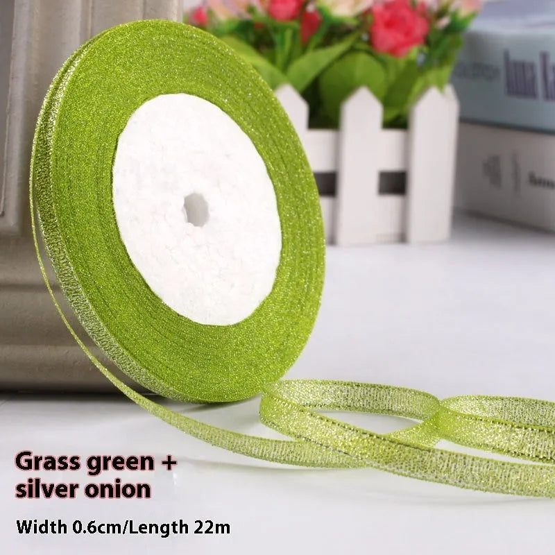 Roll of polyester gift packaging ribbon with 0.6cm width and 22 metre length in various colour options