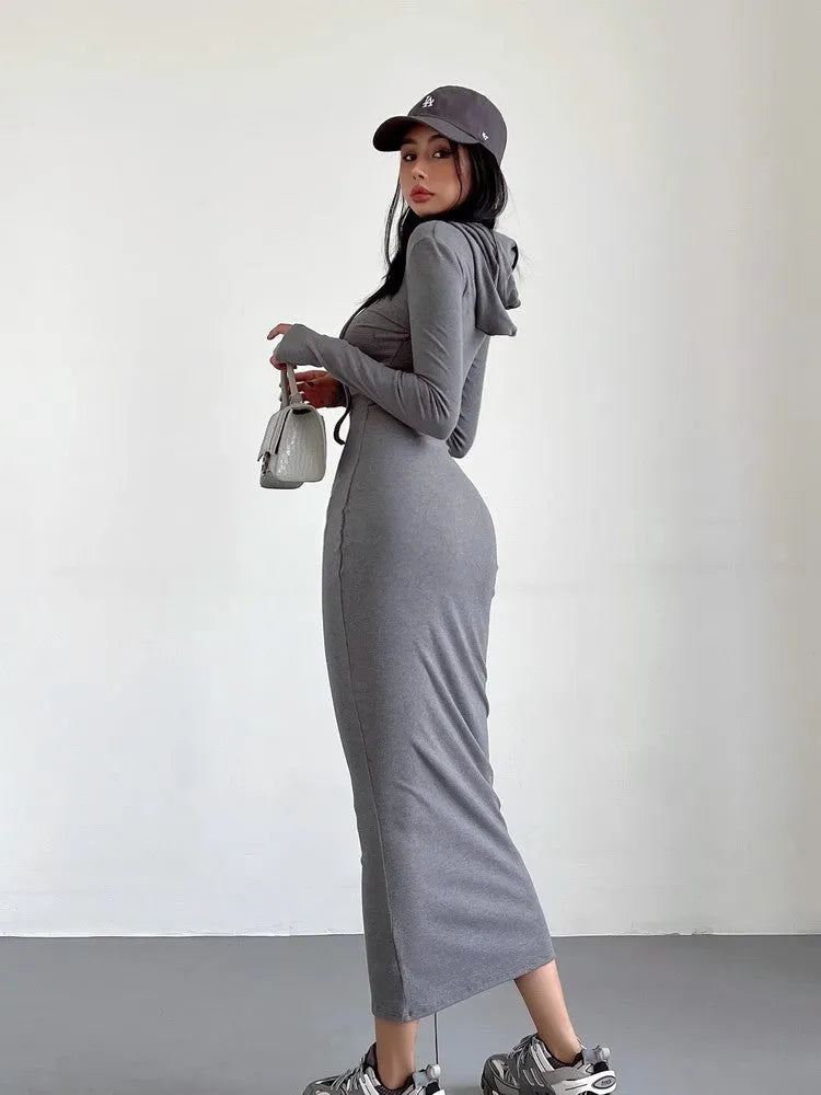 Women's grey hooded long sleeve sheath dress with a high waist on a hanger.