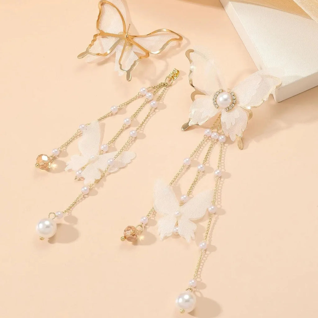 White electroplated butterfly tassel lace pearl rhinestone earrings with insect-shaped design
