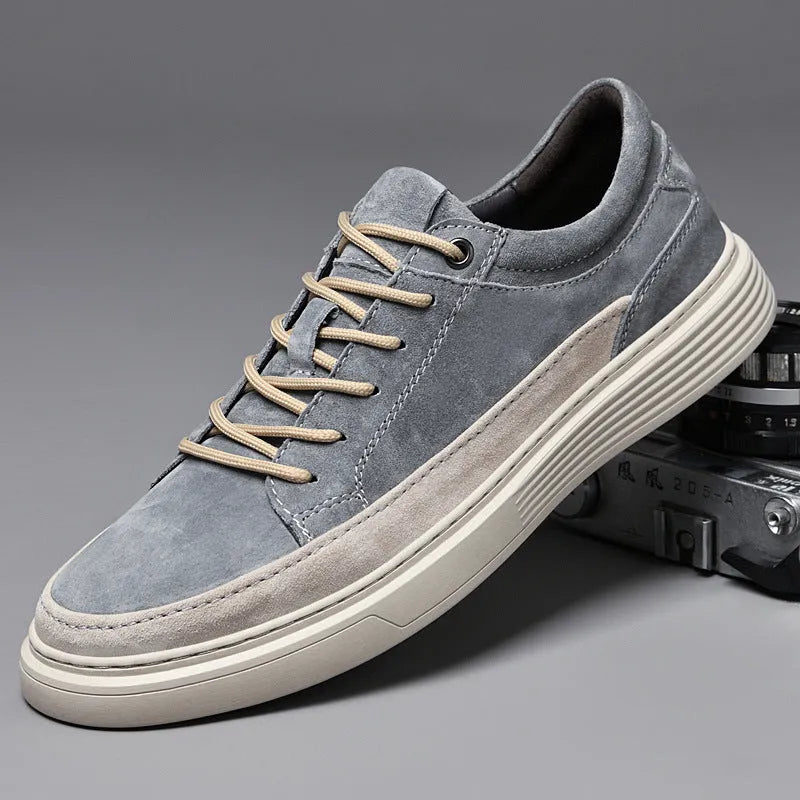 Men's grey casual leather skate shoes with round toe design and rubber sole