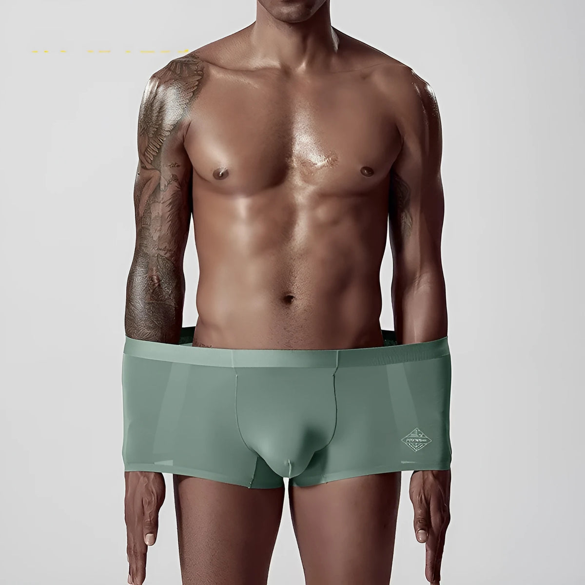 One-piece seamless modal men's underwear in a solid colour with a mid waist design.