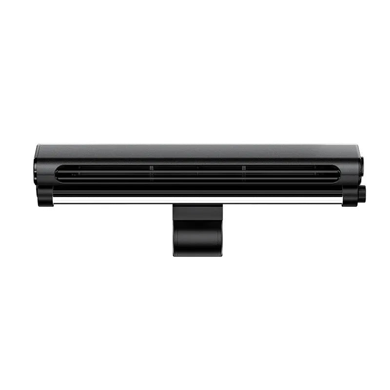 Black USB-powered bladeless clip-on fan with integrated lamp attached to a laptop screen.