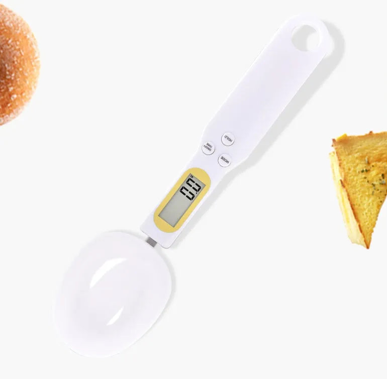 Electronic measuring spoon scale with digital display showing weight measurement