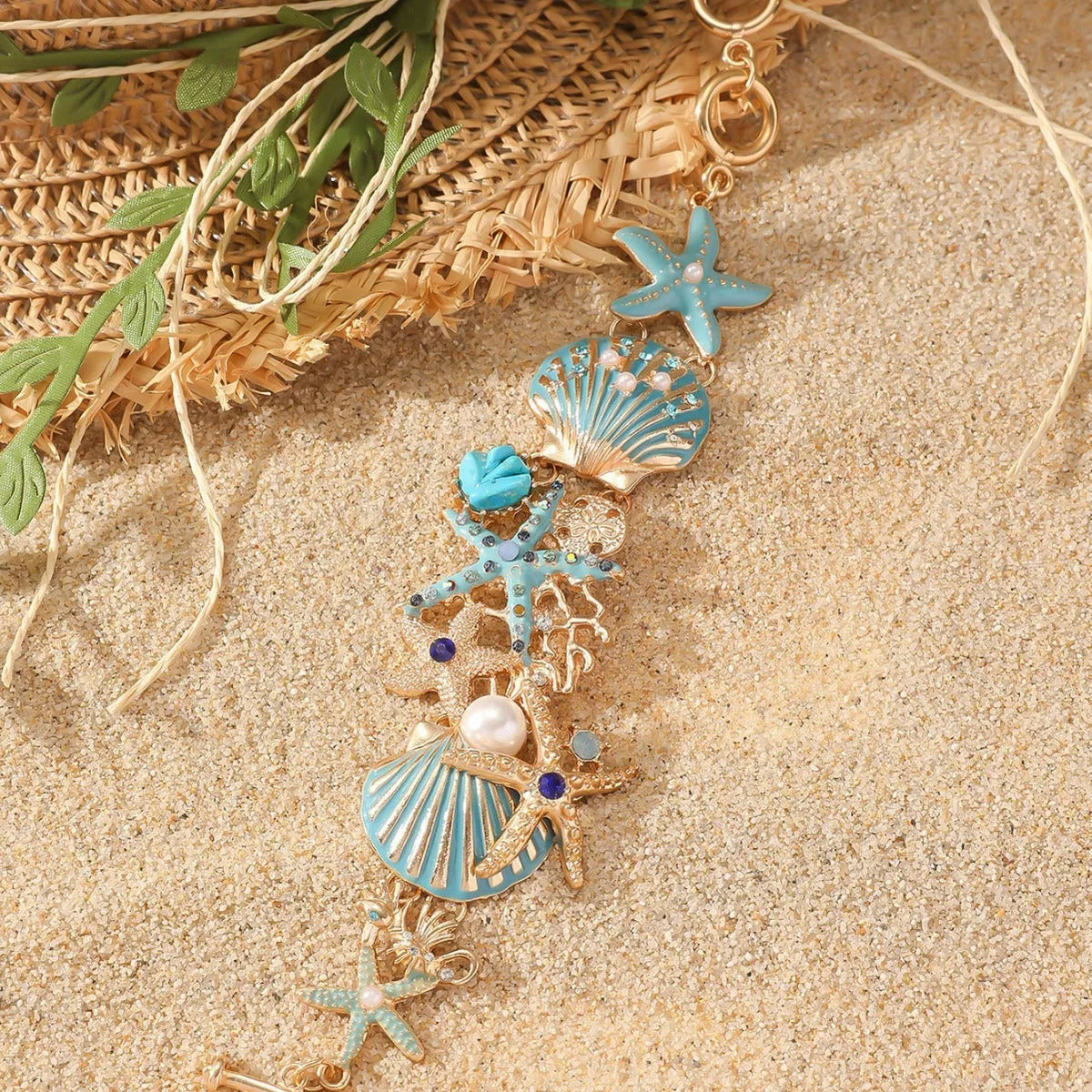 Women's alloy rhinestone bracelet featuring marine anchor and starfish design in coastal colours
