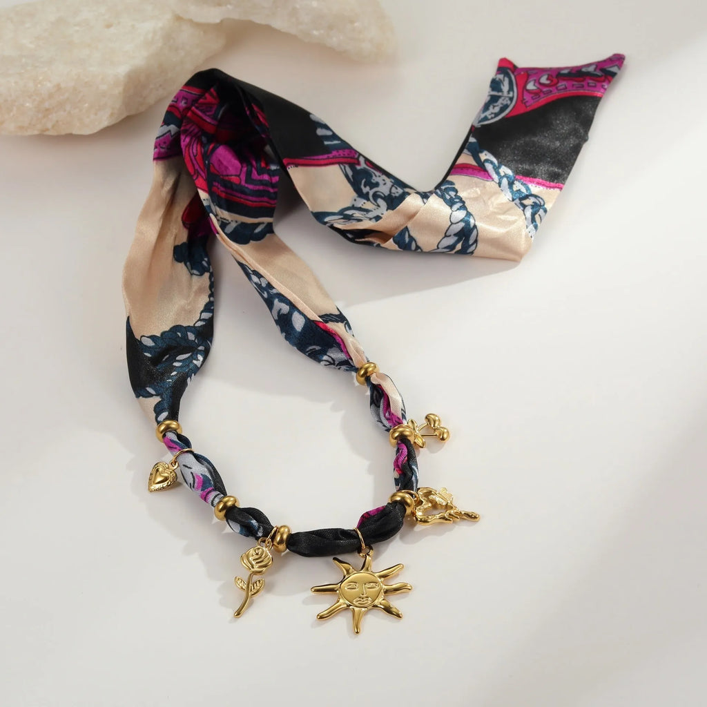 Women's geometric pendant necklace with adjustable chain on black background