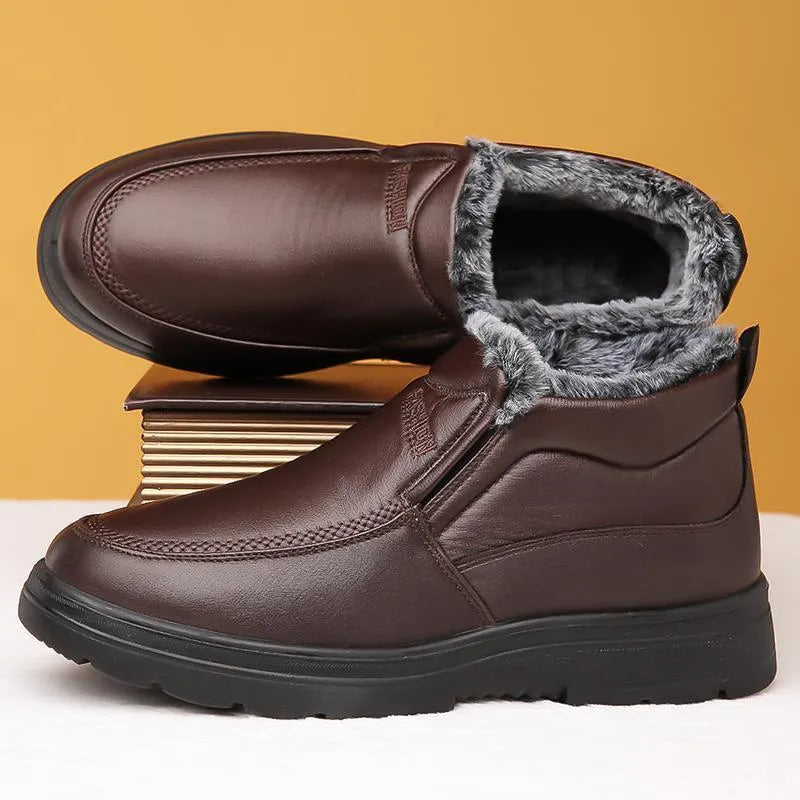 Men's black casual winter slip-on shoes with a waterproof PU upper and thick rubber sole.