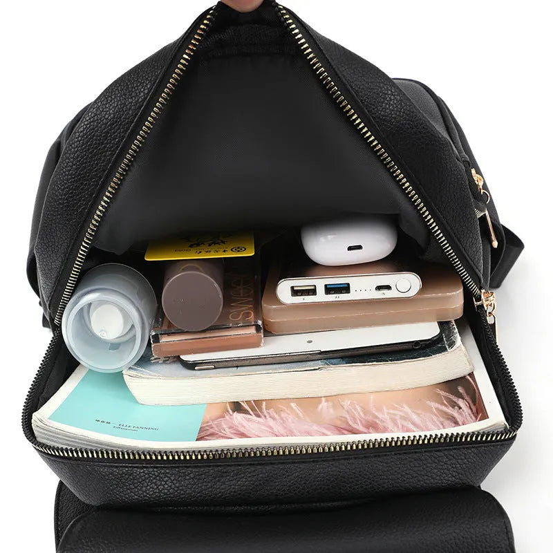 Women's casual soft PU backpack with three-dimensional front pocket in black, blue, or taro purple colours