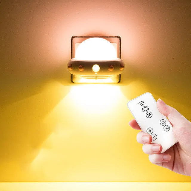 Blue remote control UFO shaped bedside night light with dimensions 105x76x58mm