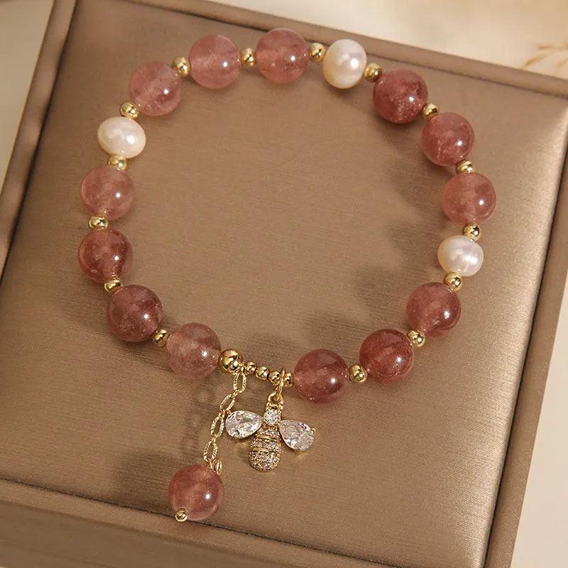Women's strawberry quartz and freshwater pearl bracelet with zircon details and alloy clasp