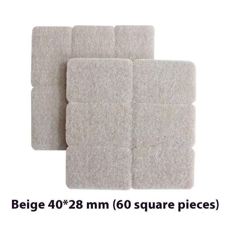 Beige plastic furniture leg stopper pads in five different sizes on a wooden floor