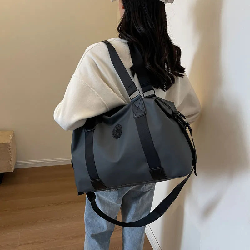 36-55L waterproof Oxford cloth travel bag with breathable back panel in black, grey, red or blue colour