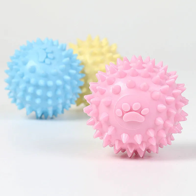 Blue TPR rubber dog chew ball with textured surface for tooth cleaning, 6cm diameter.