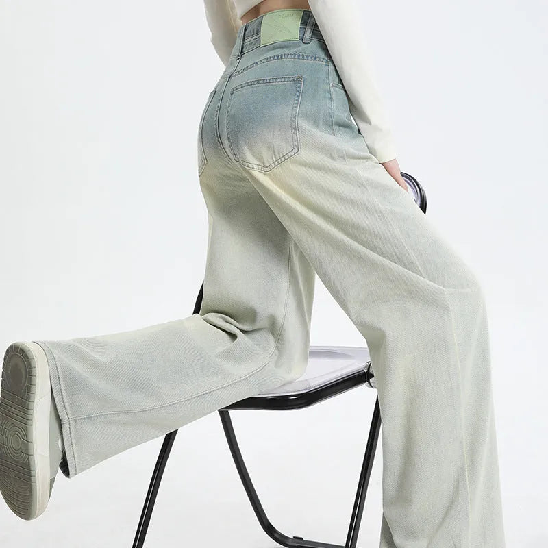 Women's straight-leg denim trousers in a gradient blue colour with a wide leg fit.