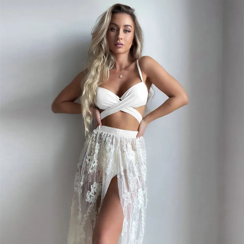 Three-piece backless push-up bikini set in polyester fabric with top, panties and skirt components