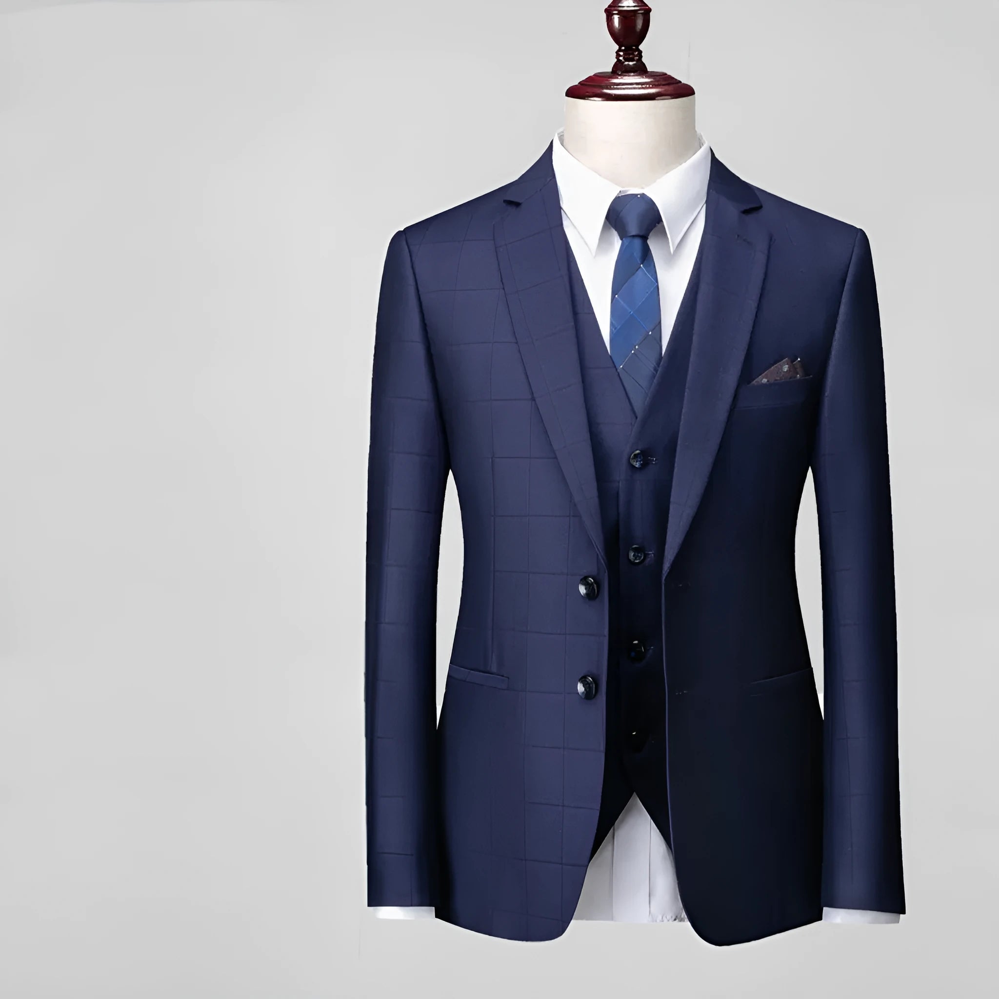 Men's navy blue three-piece business casual suit with slim fit plaid design showing jacket, vest and trousers