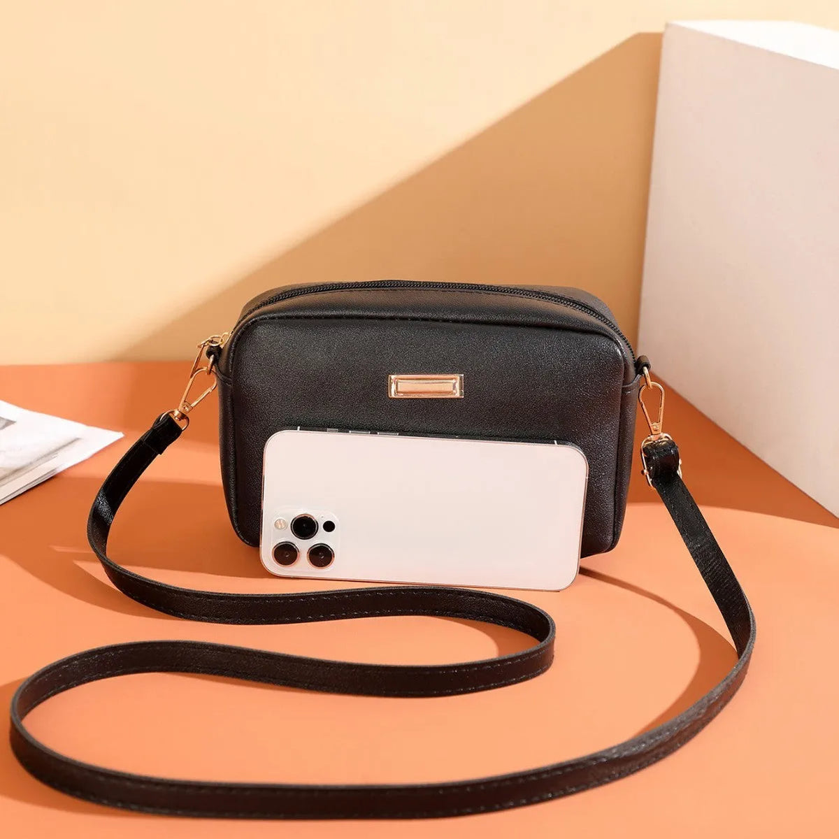 Solid colour women's PU shoulder bag with three-dimensional pockets in urban simplicity style