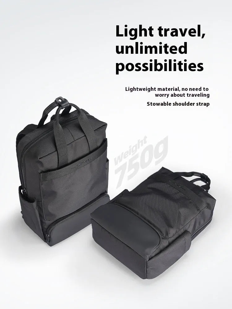 Elegant Black Oxford cloth computer backpack with a 20-35 litre capacity and polyester lining.