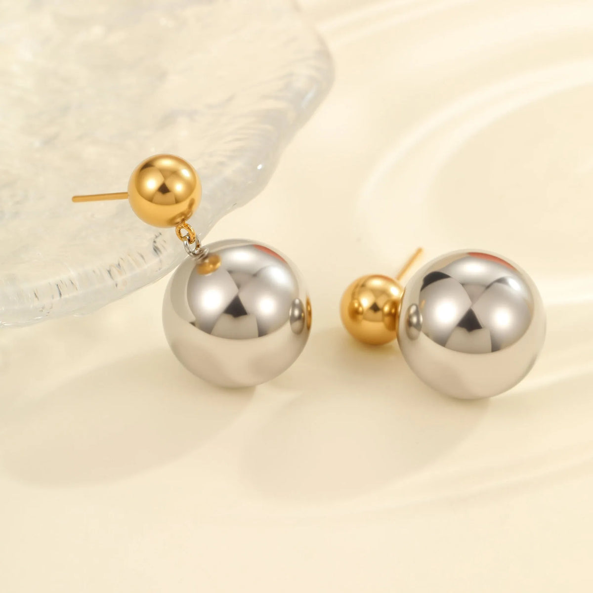 Stainless steel geometric round bead ear studs with gold electroplating and colour-block detailing