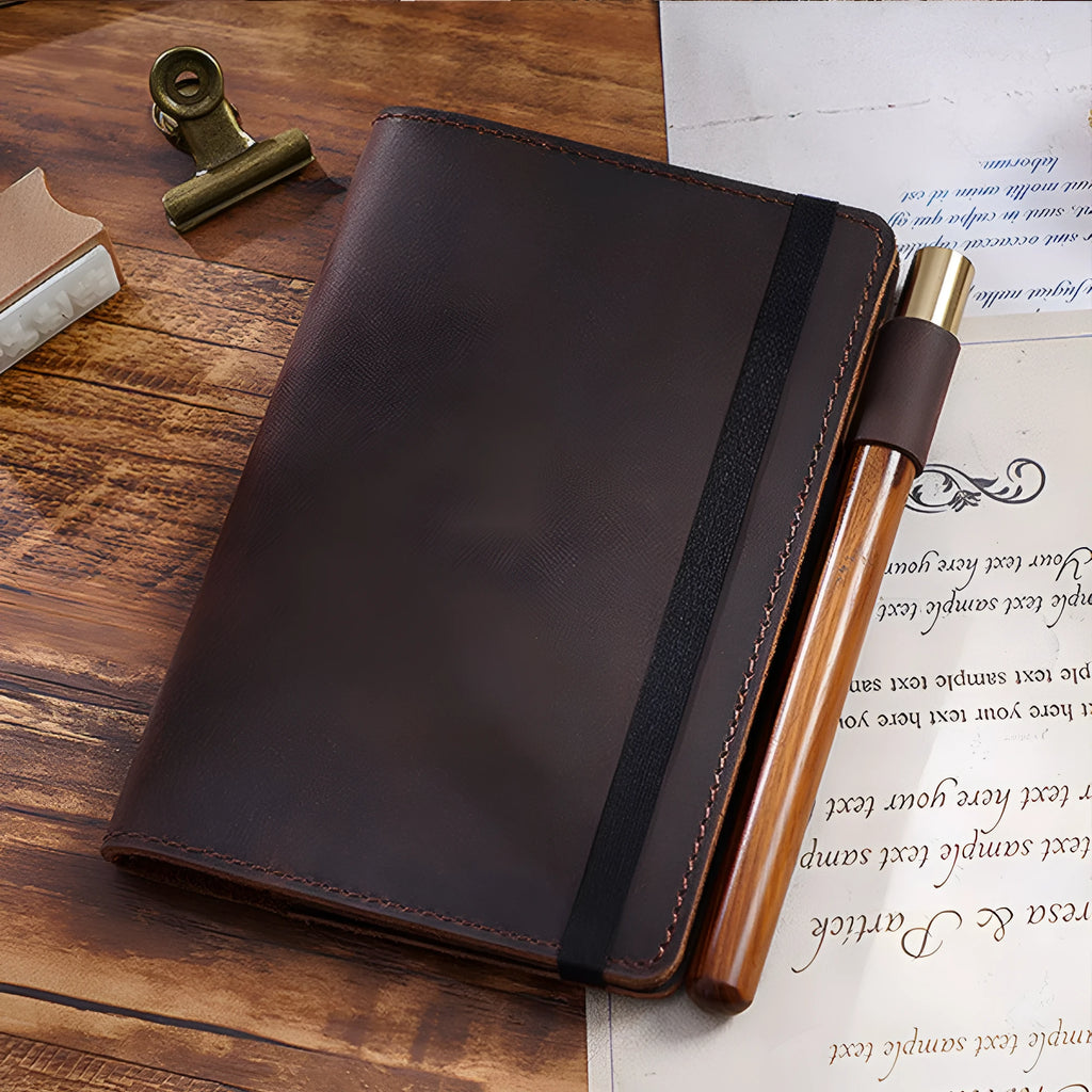 Handmade old-fashioned kraft notebook with cowhide cover, open to show wood-free paper pages.