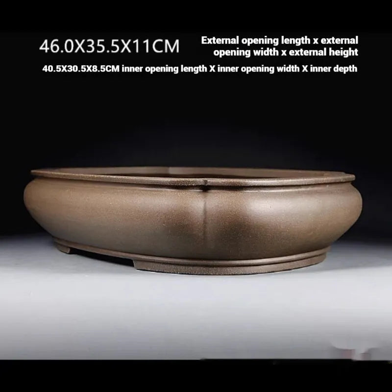 Handmade antique purple clay papaya-shaped large flower pot for indoor plants.