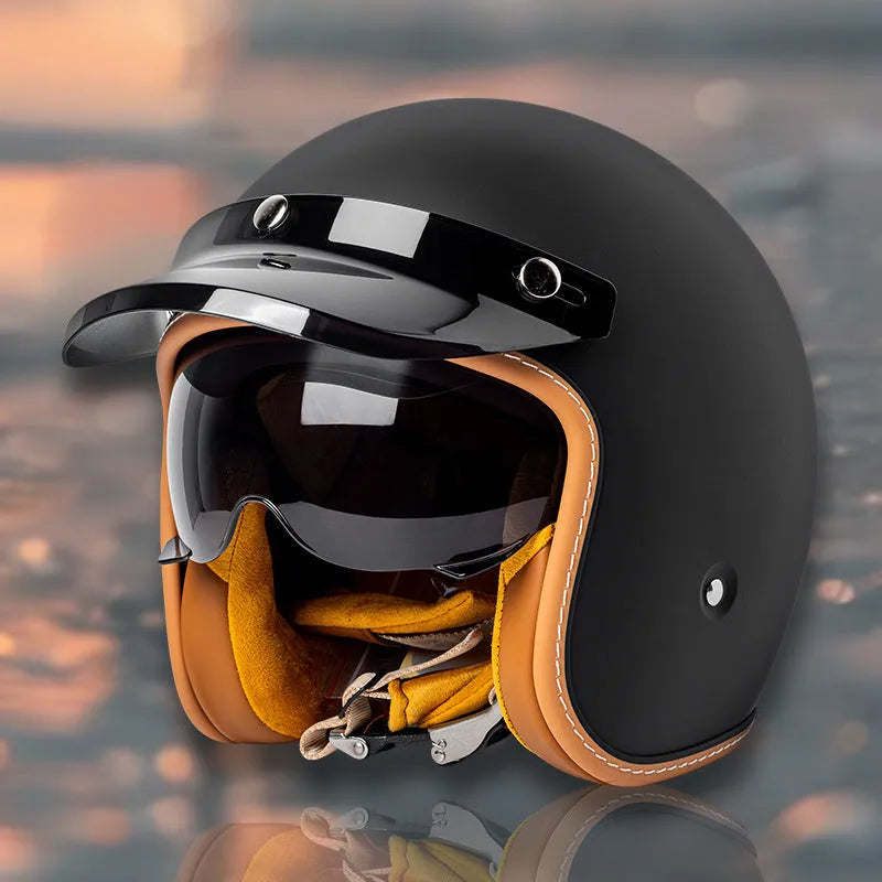 Retro-style half helmet for riding, shown in a selection of colours including black, grey, white, and orange on a neutral background.