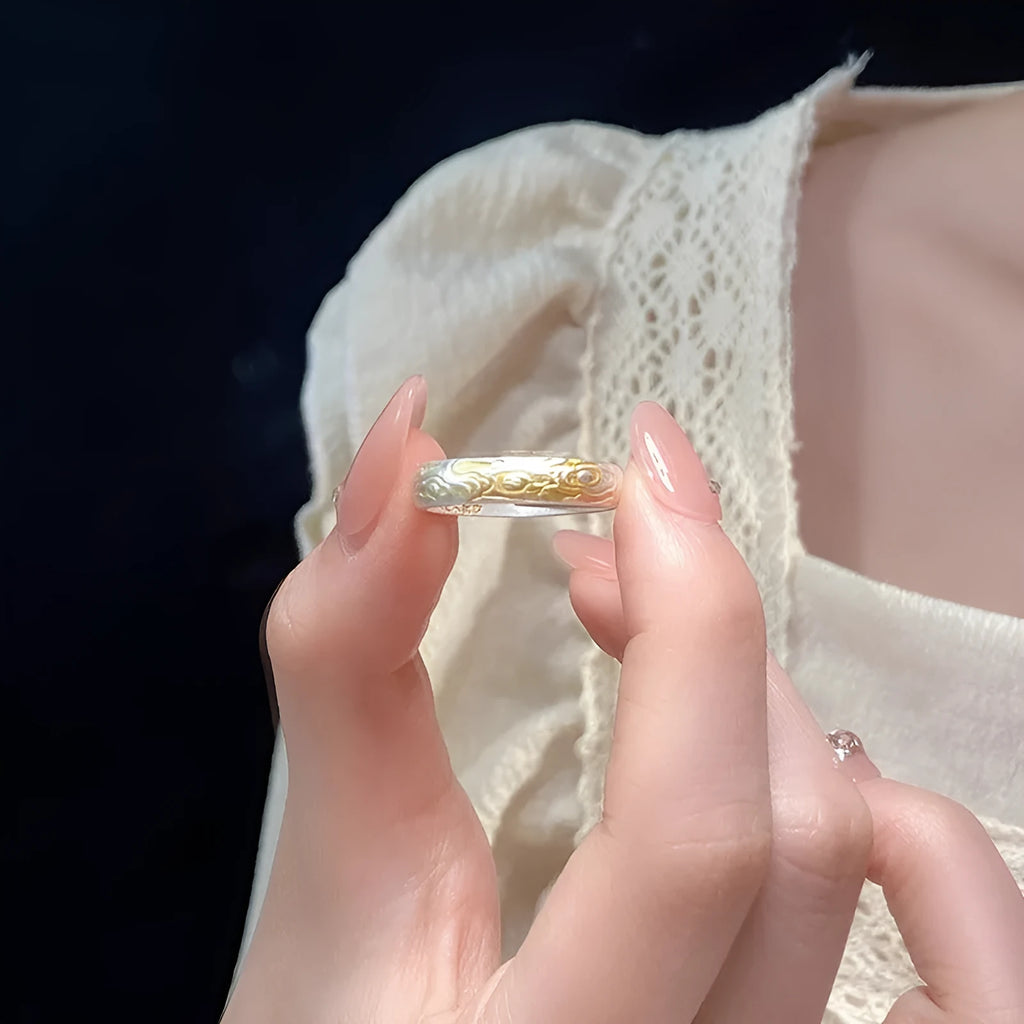 Adjustable open-mouth ring with geometric Xiangyun pattern in silver gold electroplated finish on white copper.