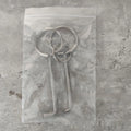 Two metal alloy wrench tools from a portable 2-piece set for household and vehicle maintenance.