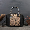 Vintage-style genuine leather messenger bag in black, showing internal zipper and phone pockets.
