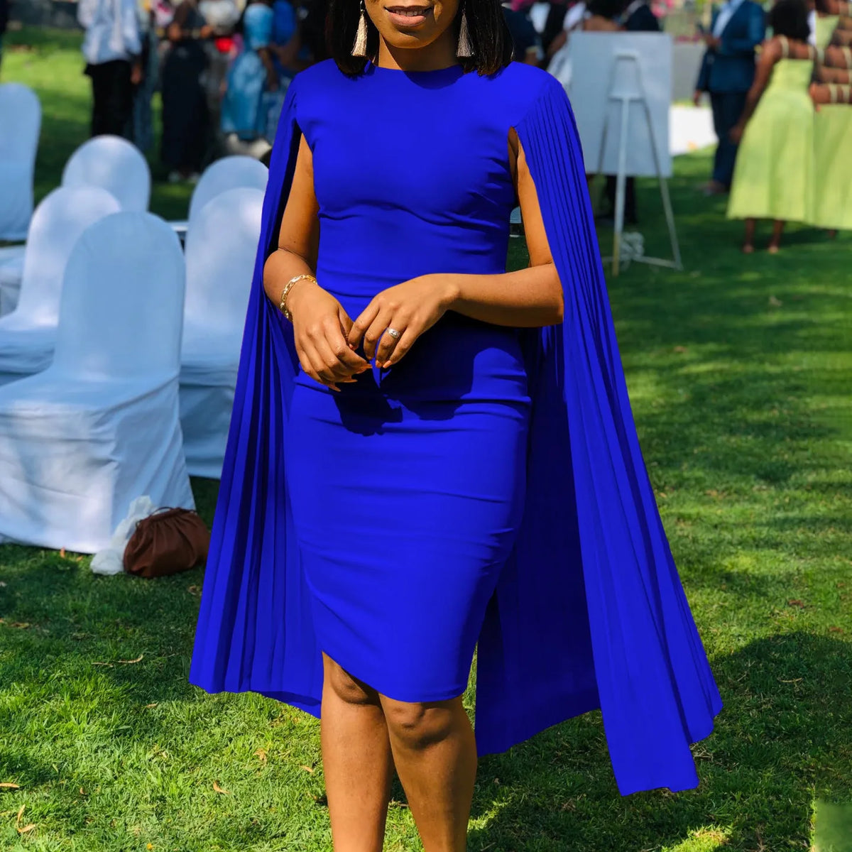Women's long sleeve evening gown with pleated shawl collar and high waist in a choice of colours.